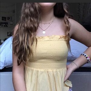 yellow strapless top